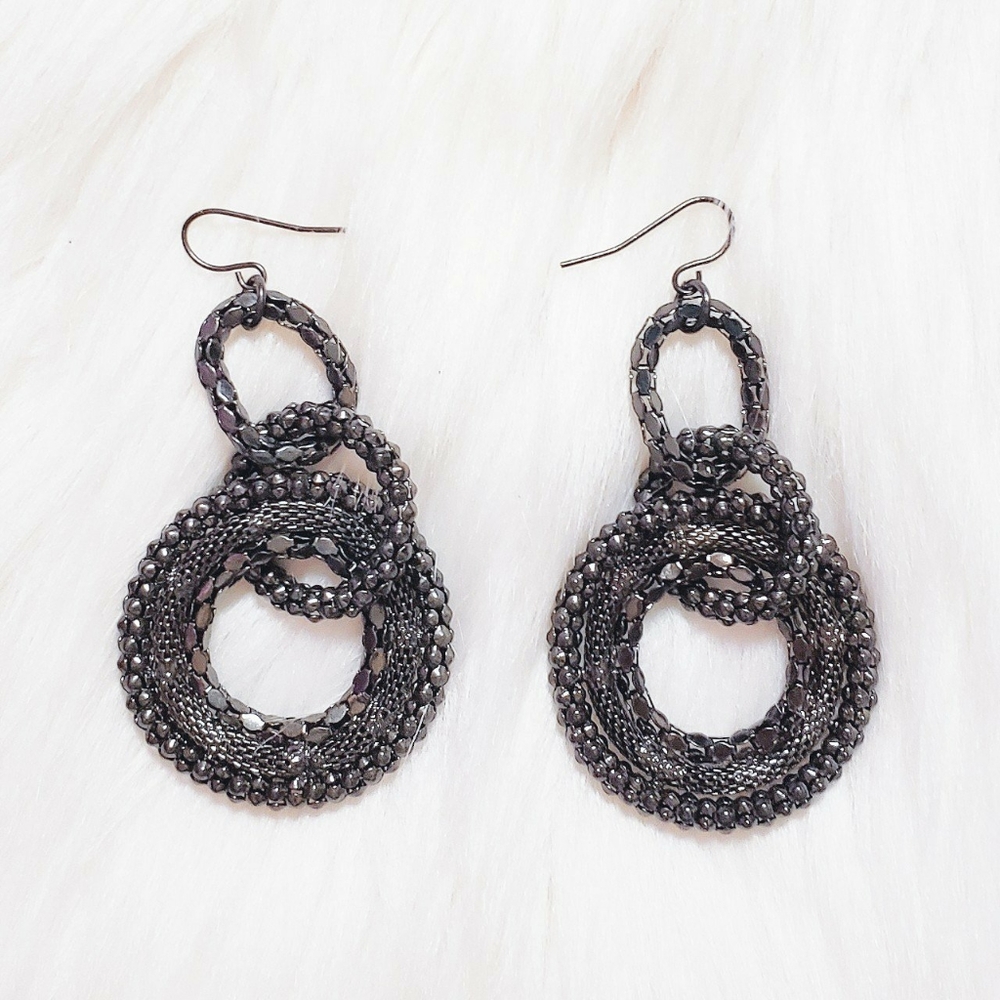 Black dangling metallic circle earrings